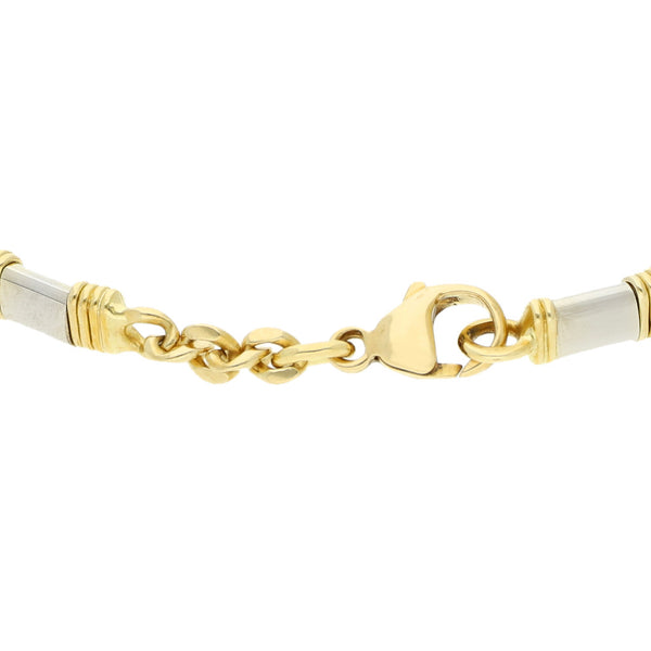 Pulsera de arillo diseño especial en oro dos tonos 18 kilates.