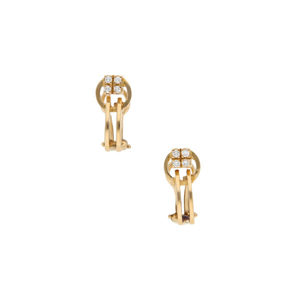 Aretes calados con diamantes en oro amarillo 18 kilates.