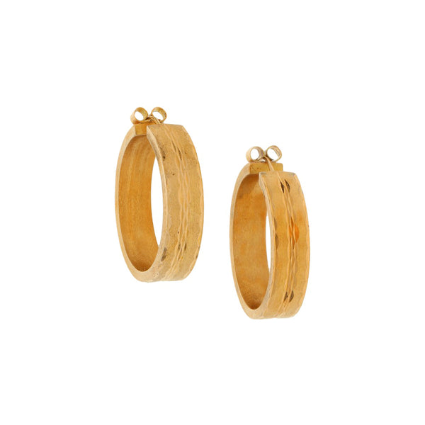 Arracadas facetadas en oro amarillo 18 kilates.