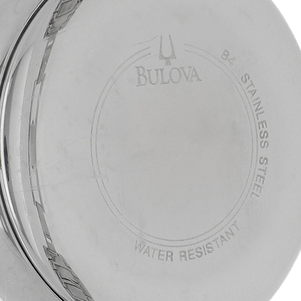 Reloj Bulova para dama en acero/Chapa.