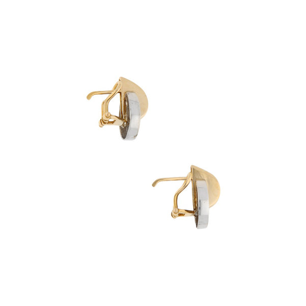 Aretes diseño especial en oro dos tonos 14 kilates.