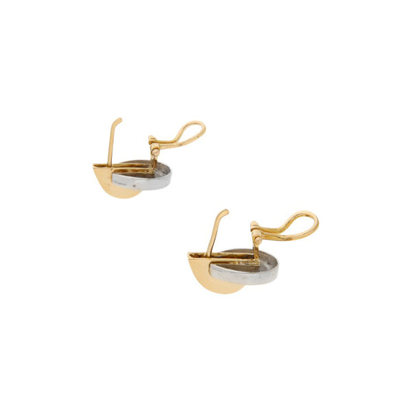 Aretes diseño especial en oro dos tonos 14 kilates.