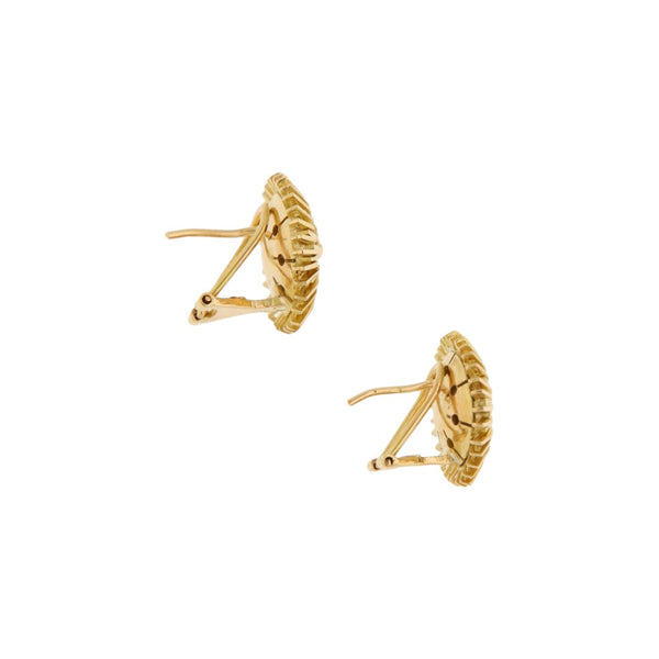 Aretes articulados en oro amarillo 18 kilates.