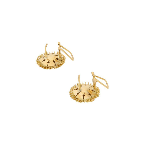 Aretes articulados en oro amarillo 18 kilates.