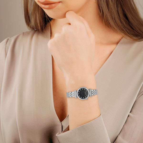 Reloj Bulova para dama en acero inoxidable.
