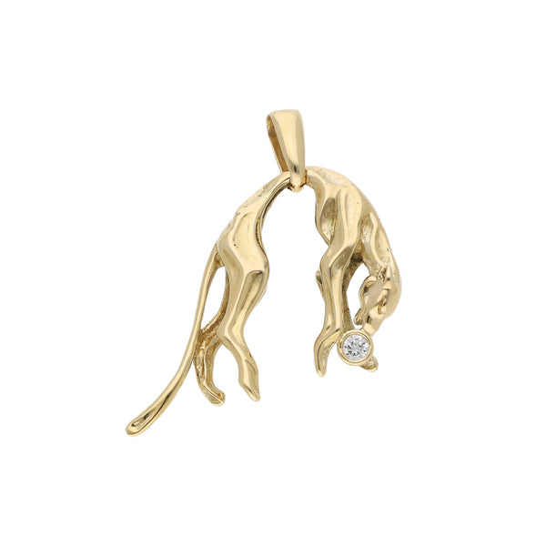 Dije estilizado motivo felino con circonia en oro amarillo 14 kilates.