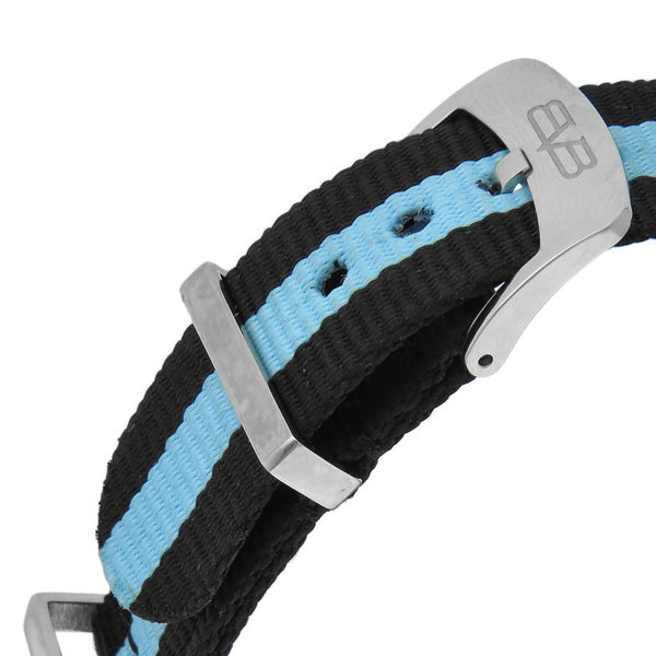 Reloj Bomberg para dama en acero y textil.