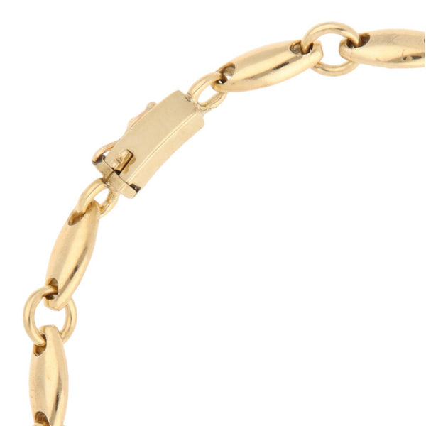Pulsera eslabón combinado en oro amarillo 18 kilates.