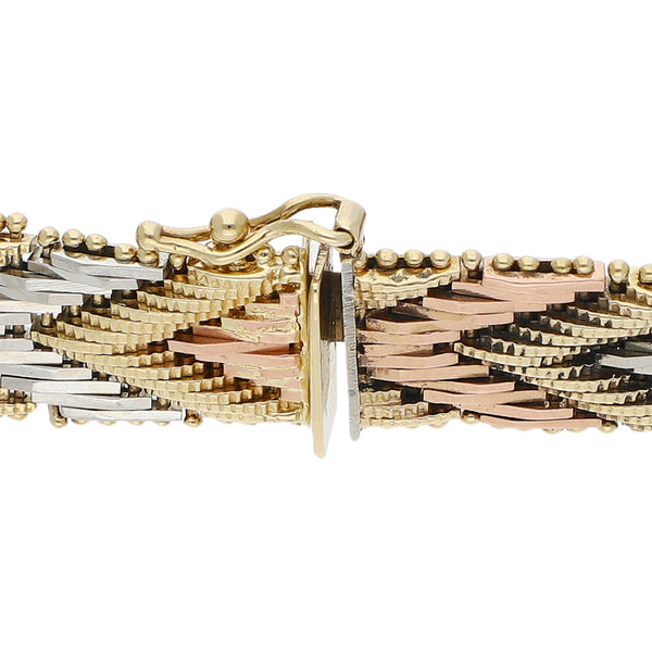Pulsera eslabón boleado en oro tres tonos 14 kilates.