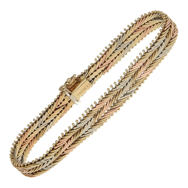 Pulsera eslabón boleado en oro tres tonos 14 kilates.