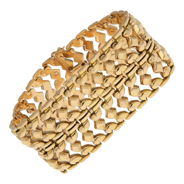 Pulsera de dos hilos eslabón articulado en oro amarillo 18 kilates.