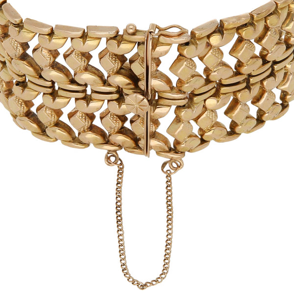 Pulsera de dos hilos eslabón articulado en oro amarillo 18 kilates.