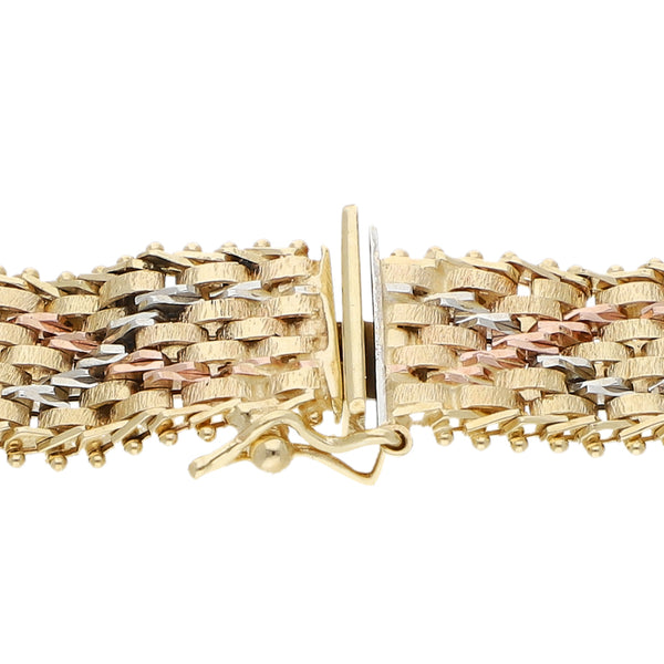 Pulsera eslabón boleado en oro tres tonos 14 kilates.