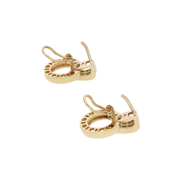 Aretes diseño especial con sintéticos en oro amarillo 14 kilates.