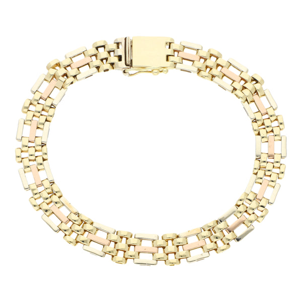 Pulsera eslabón articulado en oro tres tonos 14 kilates.
