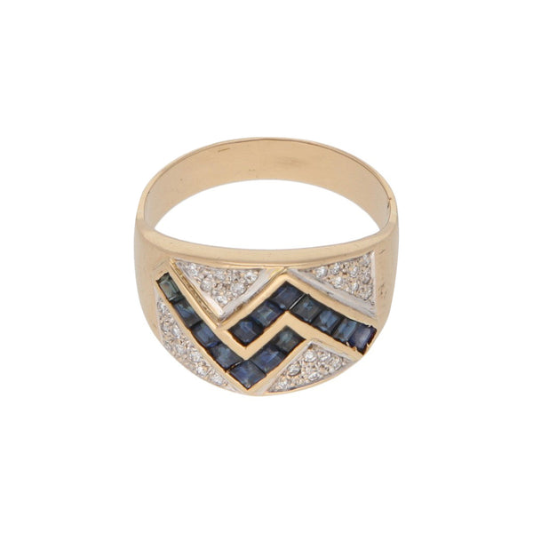 Anillo diseño especial con diamantes y zafiros en oro amarillo 18 kilates.