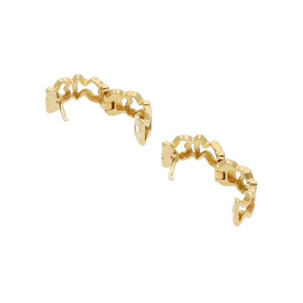 Arracadas diseño especial firma Tous en oro amarillo 18 kilates.