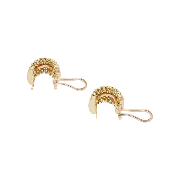 Aretes boleados en oro amarillo 14 kilates.