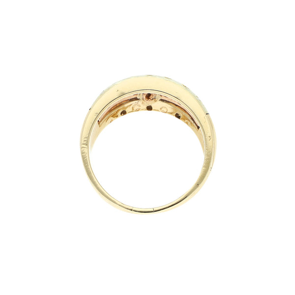 Anillo diseño especial con sintéticos en oro dos tonos 14 kilates.