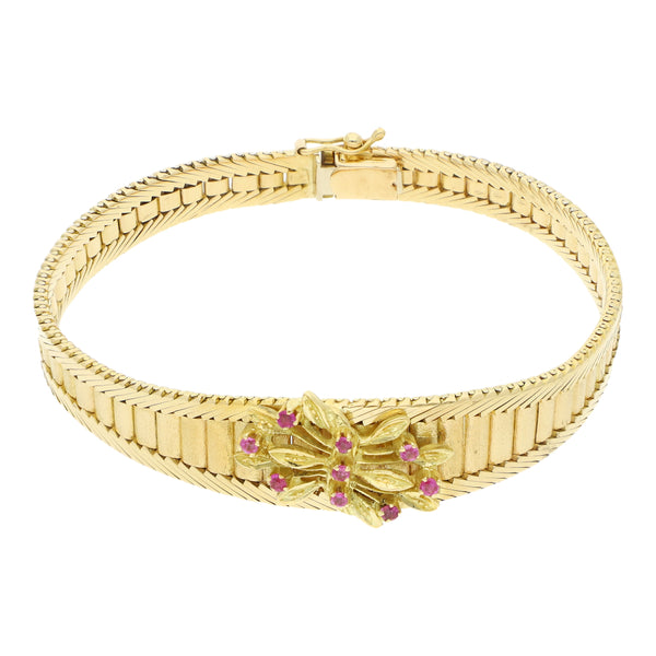 Pulsera eslabón laminado con sinteticos en oro amarillo 18 kilates.