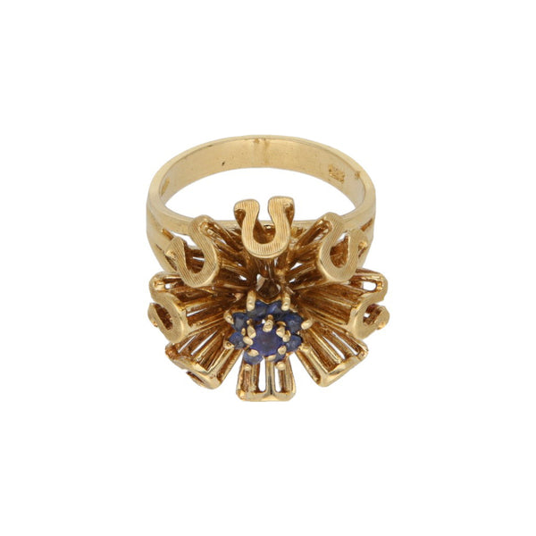 Anillo diseño especial con sinteticos en oro amarillo 18 kilates.
