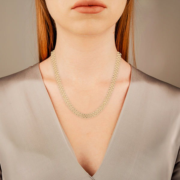 Collar eslabón articulado en oro amarillo 14 kilates.