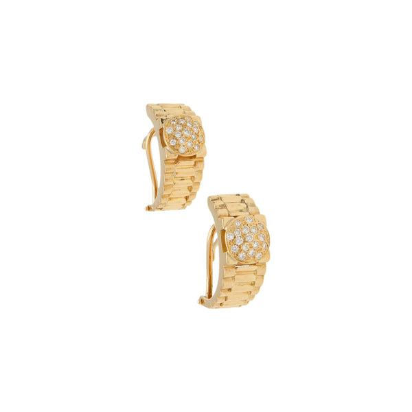 Aretes diseño especial con diamantes en oro amarillo 18 kilates.