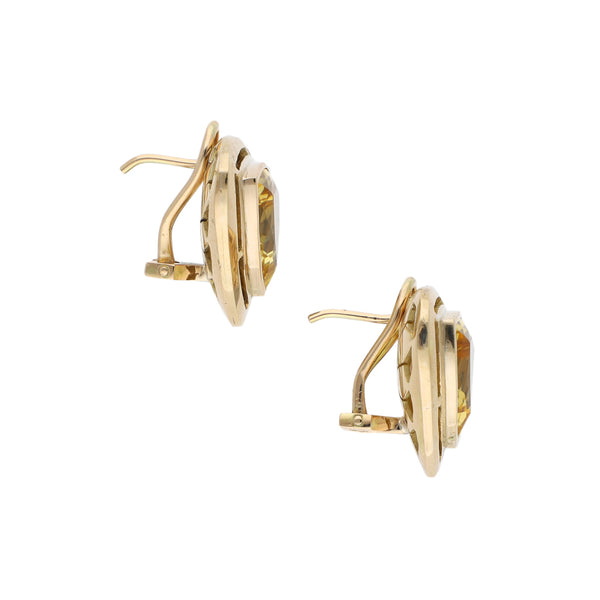 Aretes diseño especial con cuarzos en oro amarillo 14 kilates.