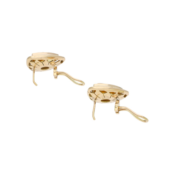 Aretes diseño especial con cuarzos en oro amarillo 14 kilates.