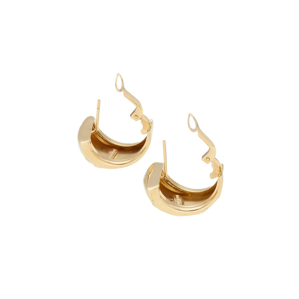Aretes diseño especial con esmalte en oro amarillo 14 kilates.