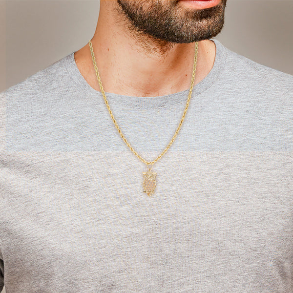 Collar eslabón torzal y dije calado motivo búho en oro tres tonos 14 kilates.
