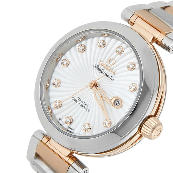Reloj Omega para dama modelo Ladymatic vistas en oro rosa 18 kilates.