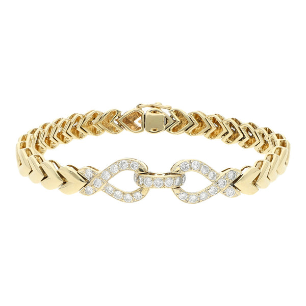 Pulsera eslabón articulado con diamantes en oro amarillo 14 kilates.
