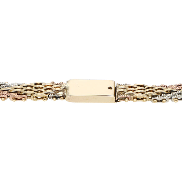 Pulsera eslabón boleado en oro tres tonos 14 kilates.