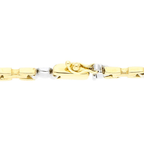 Pulsera eslabón articulado en oro dos tonos 14 kilates.
