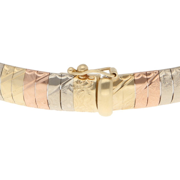 Pulsera eslabón laminado en oro tres tonos 14 kilates.
