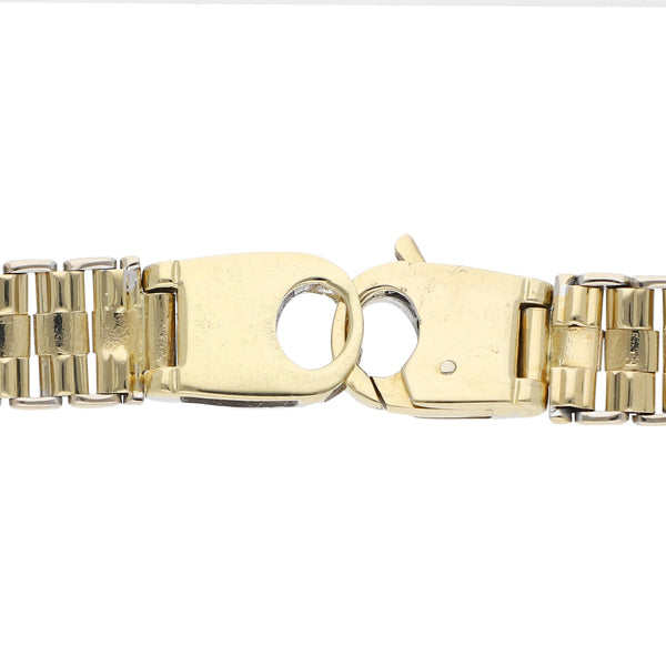Pulsera eslabón articulado en oro dos tonos 14 kilates.