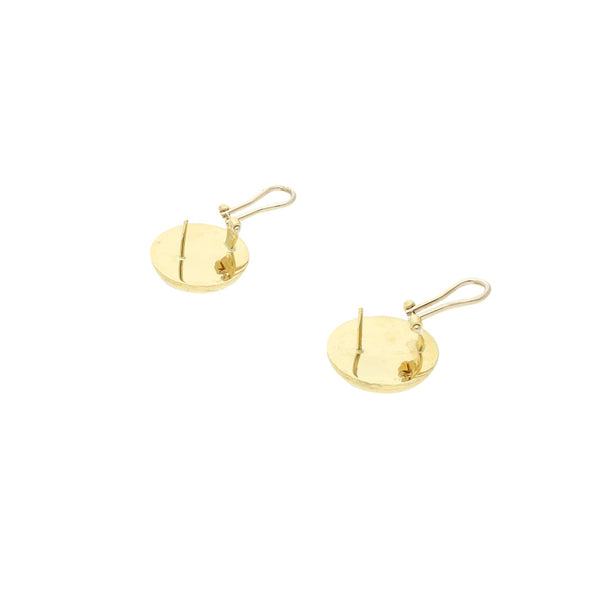 Aretes diseño especial motivo media esfera en oro amarillo 14 kilates.