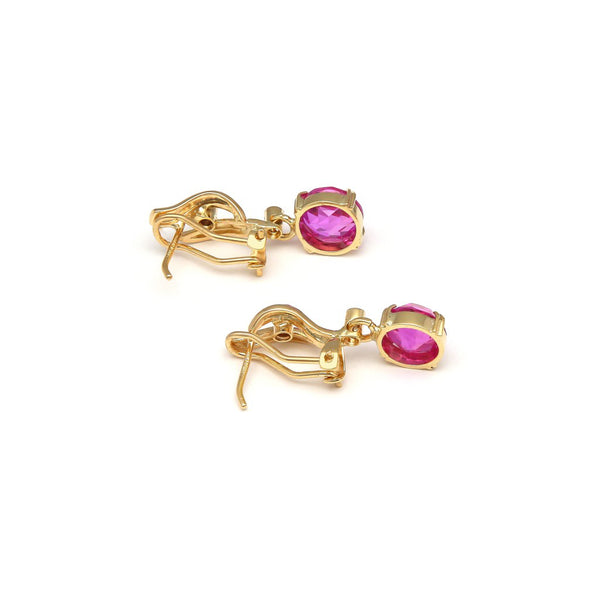 Aretes diseño especial con monzanitas y sintéticos en oro amarillo 14 kilates.