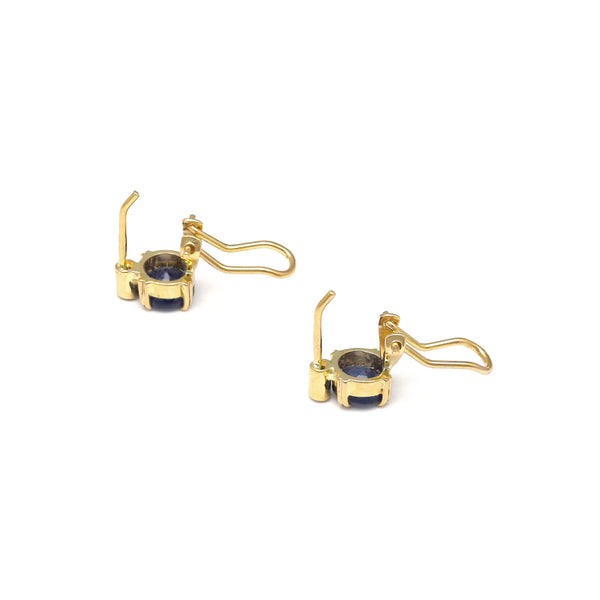 Juego de anillo, dije y aretes diseño especial con zafiros y diamantes en oro amarillo 14 kilates.