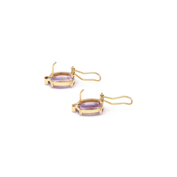 Juego de anillo y aretes diseño especial con amatista y sintéticos en oro amarillo 14 kilates.