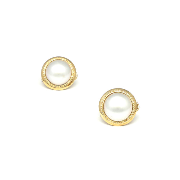Aretes torzal con media perla en oro amarillo 14 kilates.