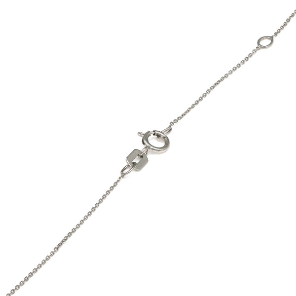 Gargantilla eslabón cruzado y cruz diseño especial con diamantes y esmeralda en oro blanco 14 kilates.