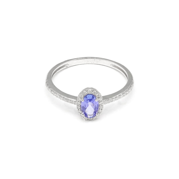 Anillo diseño especial con diamantes y tanzanita en oro blanco 14 kilates.