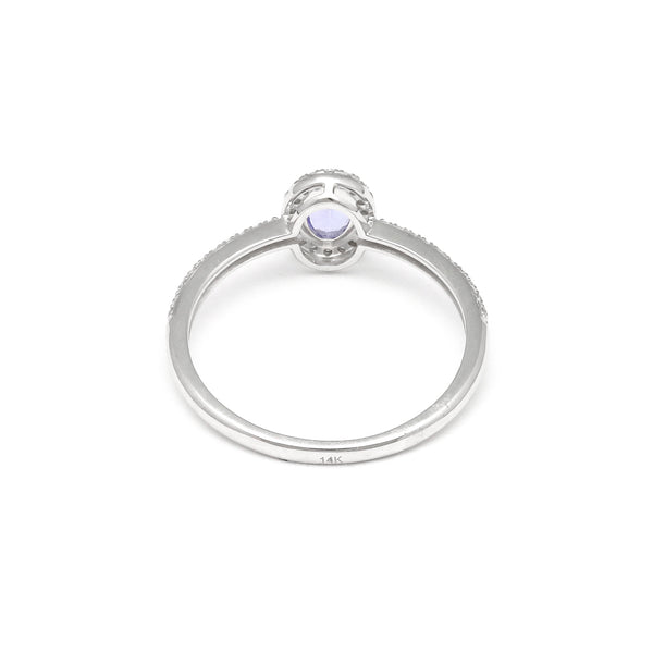 Anillo diseño especial con diamantes y tanzanita en oro blanco 14 kilates.
