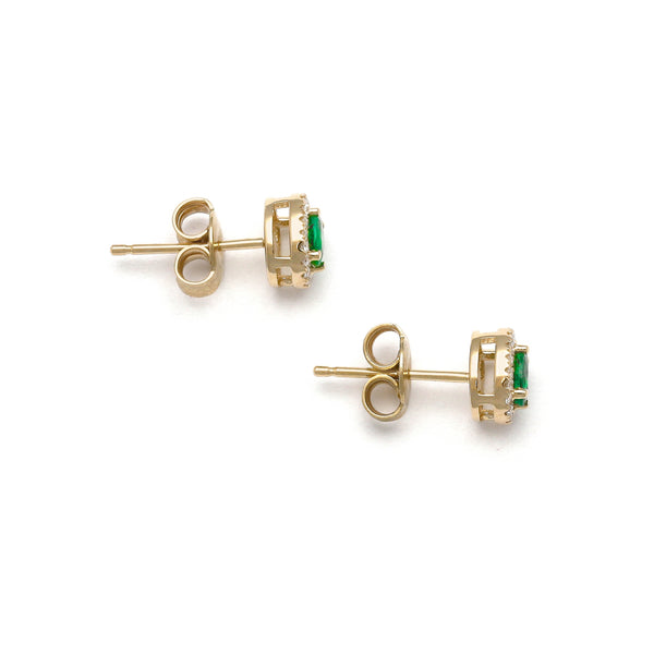 Aretes diseño especial con diamantes y esmeraldas en oro amarillo 14 kilates.