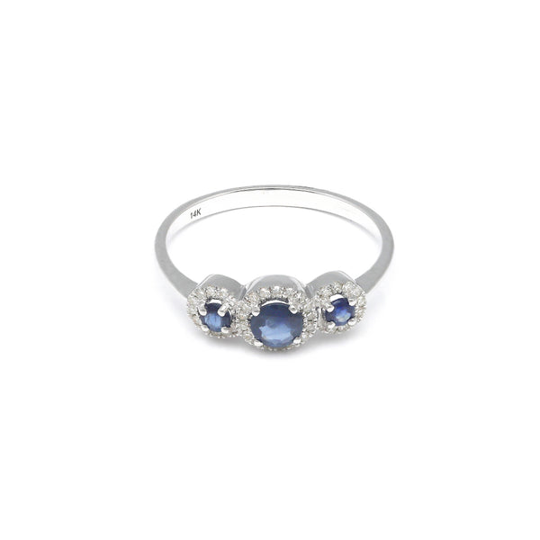 Anillo diseño especial con diamantes y zafiros en oro blanco 14 kilates.