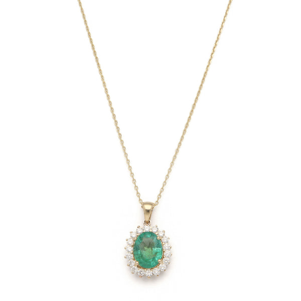Gargantilla eslabón cruzado y dije con diamantes y esmeralda en oro amarillo 14 kilates.