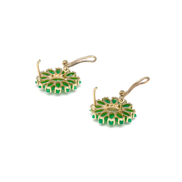 Juego de anillo y aretes diseño especial con esmeraldas en oro amarillo 14 kilates.