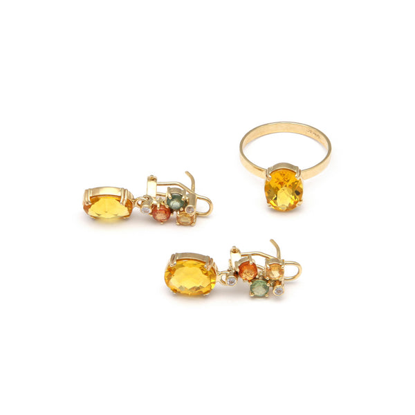 Juego de aretes y anillo diseño especial con citrino y circonias en oro amarillo 14 kilates.